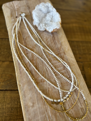 White and Brass 4 strand Necklace